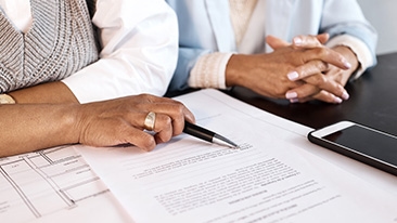 people filling out paperwork